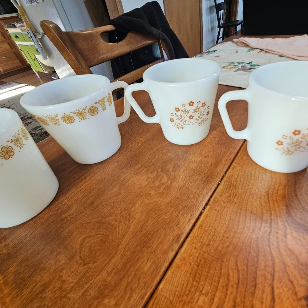 Four  cups two different patterns 2 ginger brown pattern 2butterfly pattern